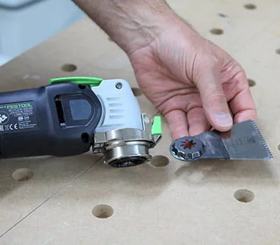 Įdėkite pjūklelį