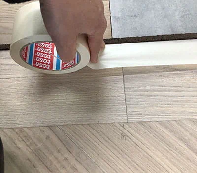 Schutzkrepp aufbringen