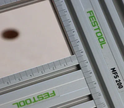 Nustatymas ant frezavimo šablono